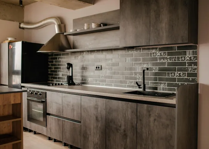 Industrial Penthouse With Panoramic Views By Parkside Boutique